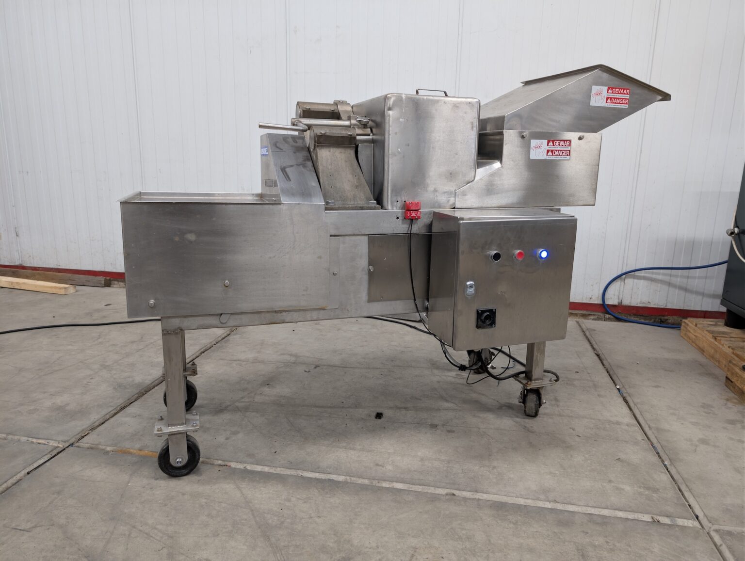 Used Urschel stainless steel cutting machine with hopper