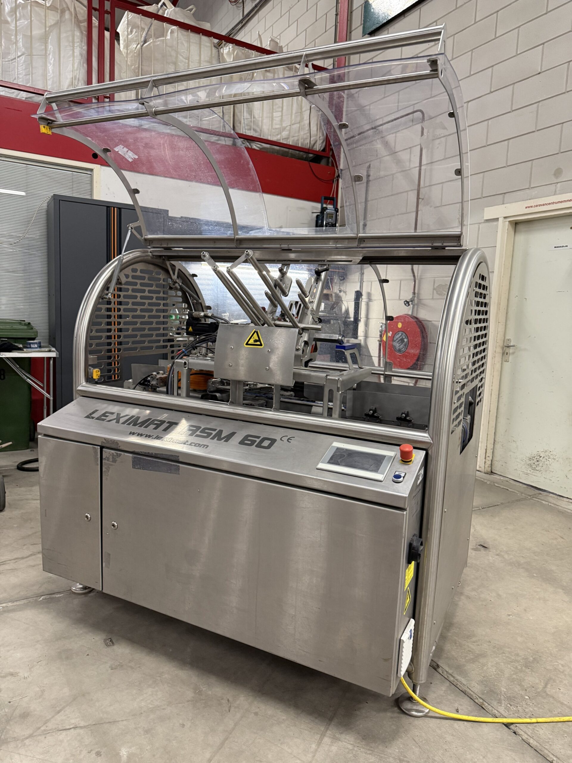 Used Leximat ASM 60 automatic bag closer