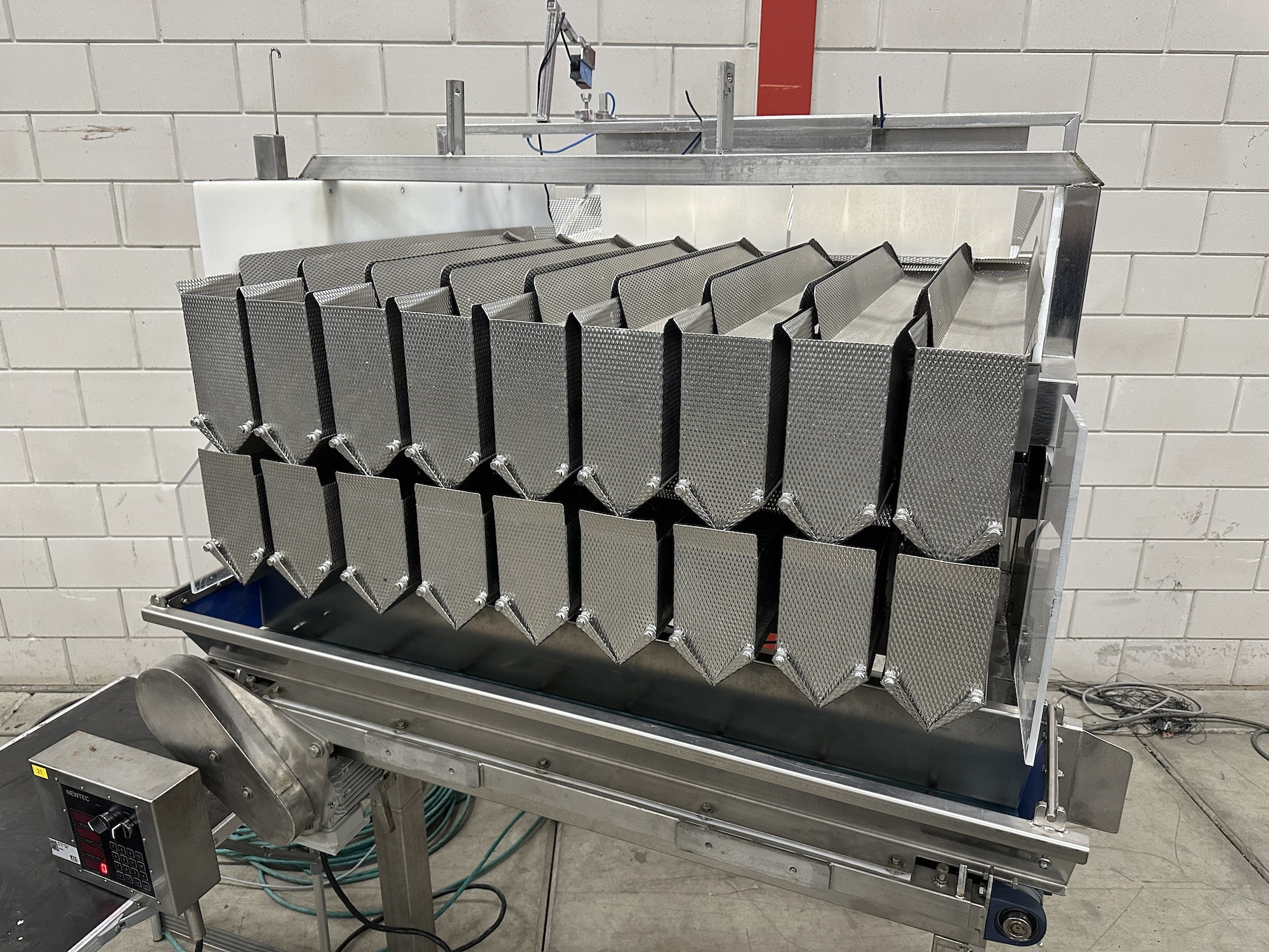 Used Newtec 9 heads weigher