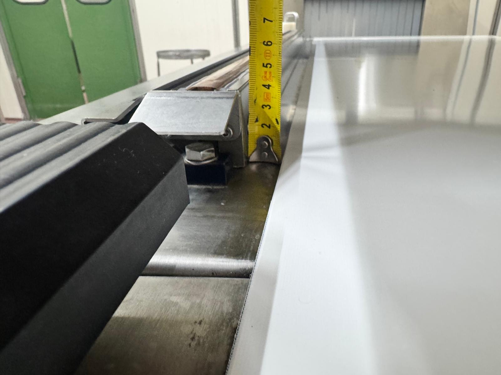 Used VC999 K7B2 conveyorized chamber vacuum packaging machine