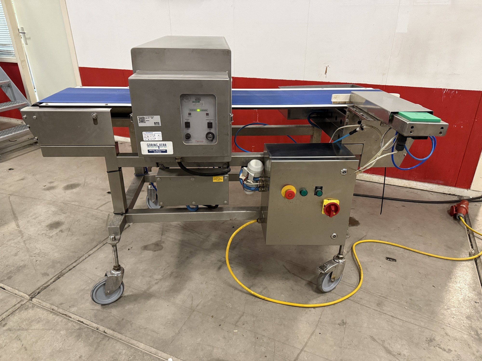 Used Goring Kerr metal detector with conveyor and reject bin
