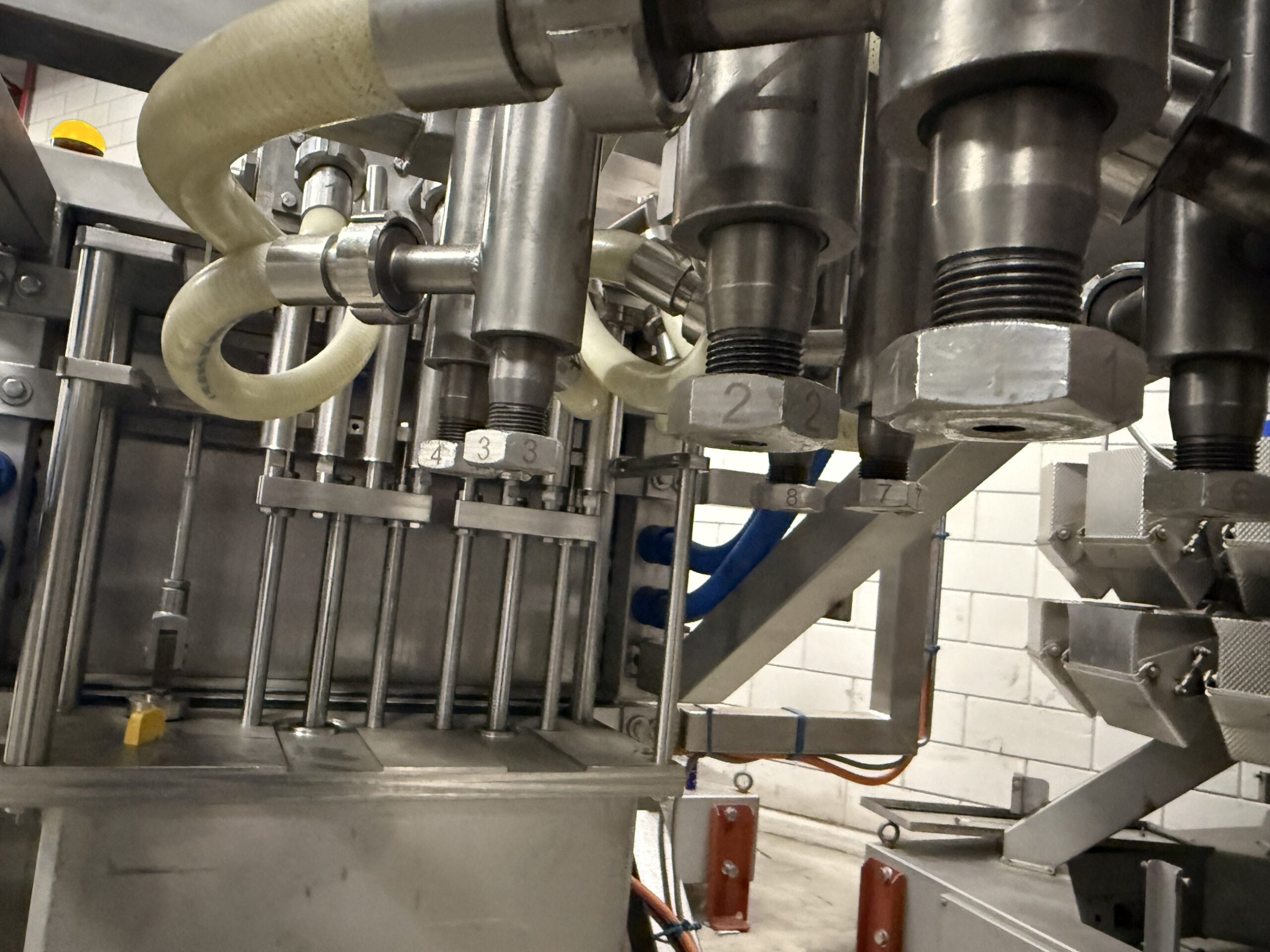 Used 8-head volumetric liquid filler for brine and sauces