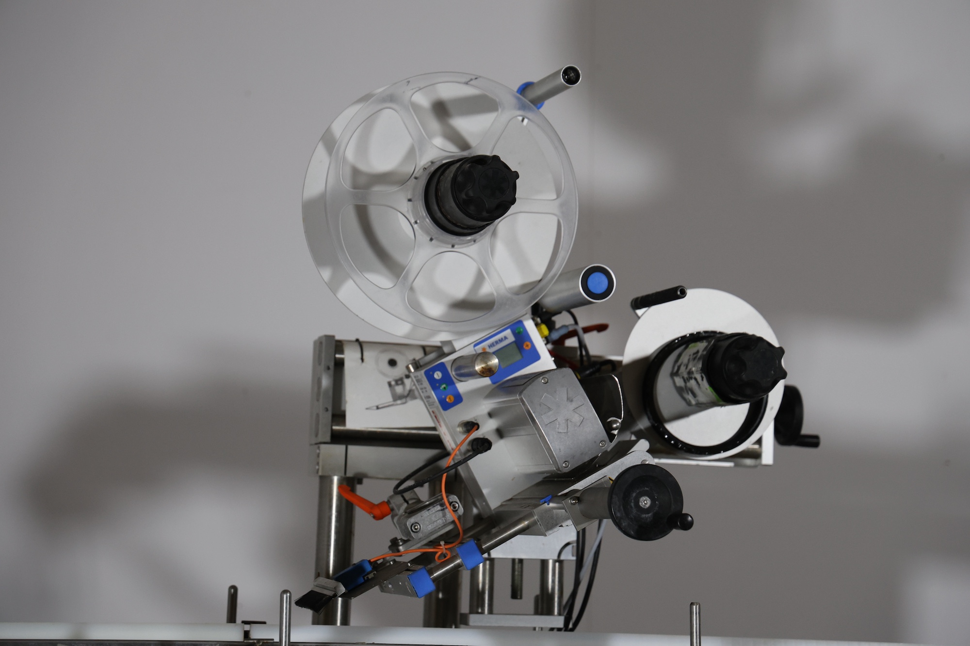 Used 2014 Herma H400 16R Labeling machine on belt