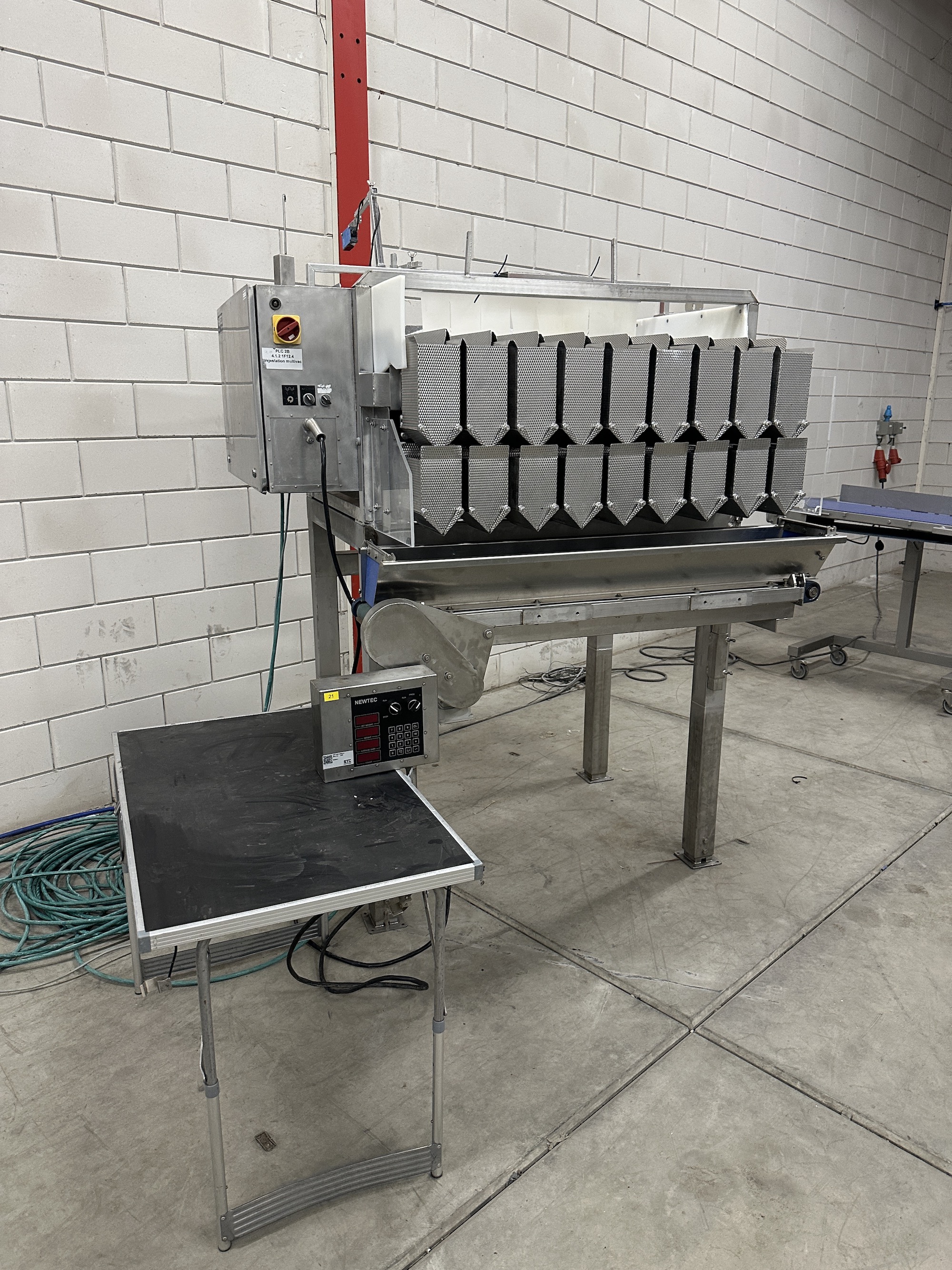 Used Newtec 9 heads weigher