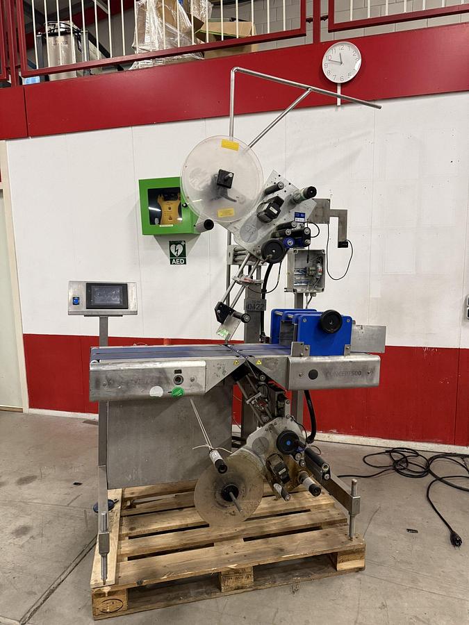 Used Marel top and bottom labelling machine with conveyor