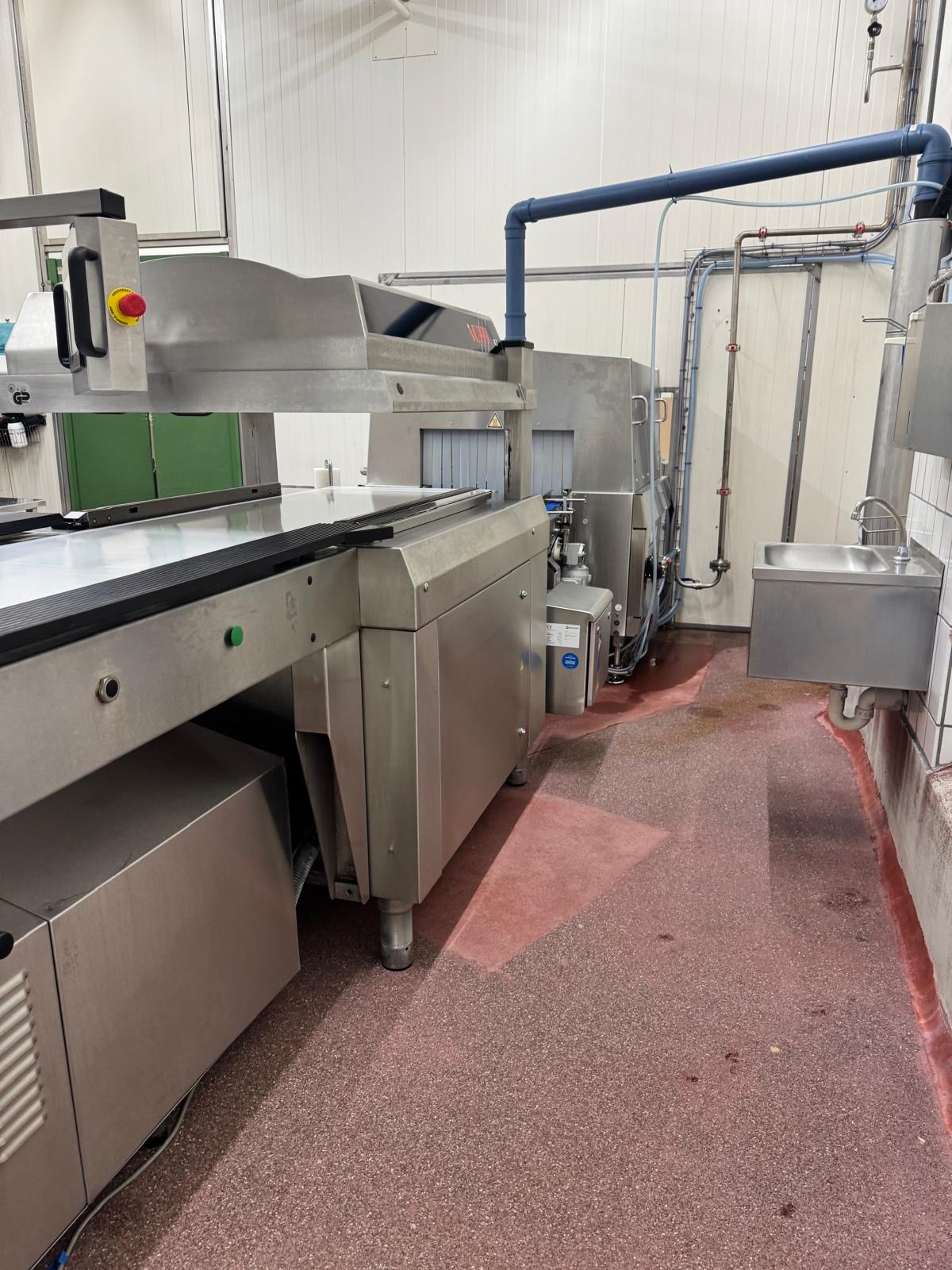 Used VC999 K7B2 conveyorized chamber vacuum packaging machine