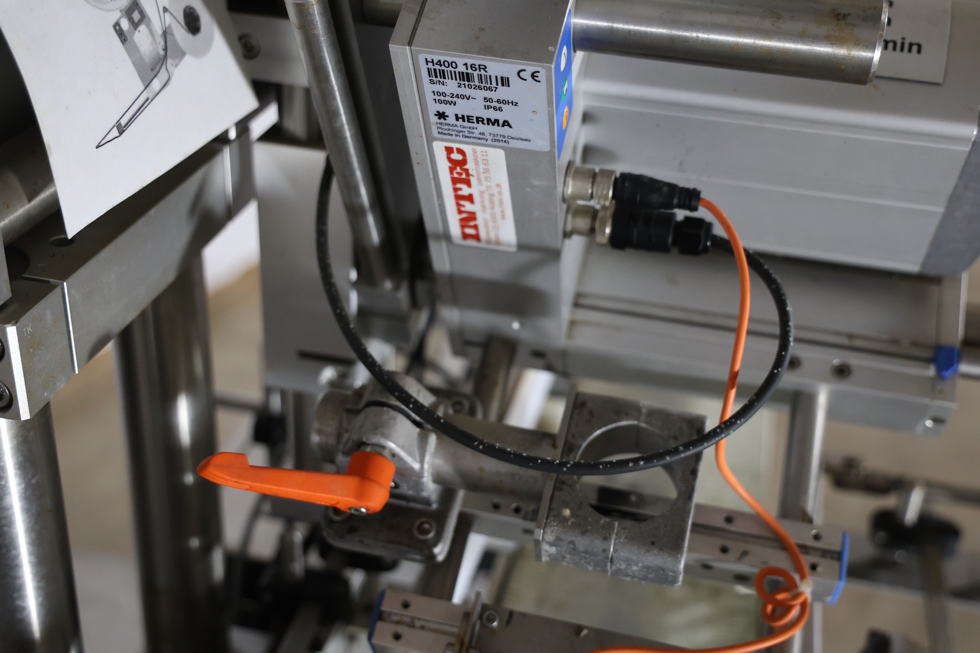 Used 2014 Herma H400 16R Labeling machine on belt