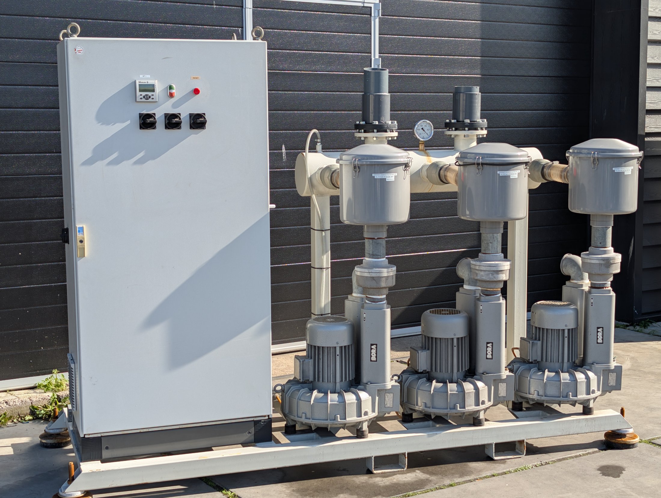 Used Bora SAP 450 three-pump vacuum unit with control cabinet