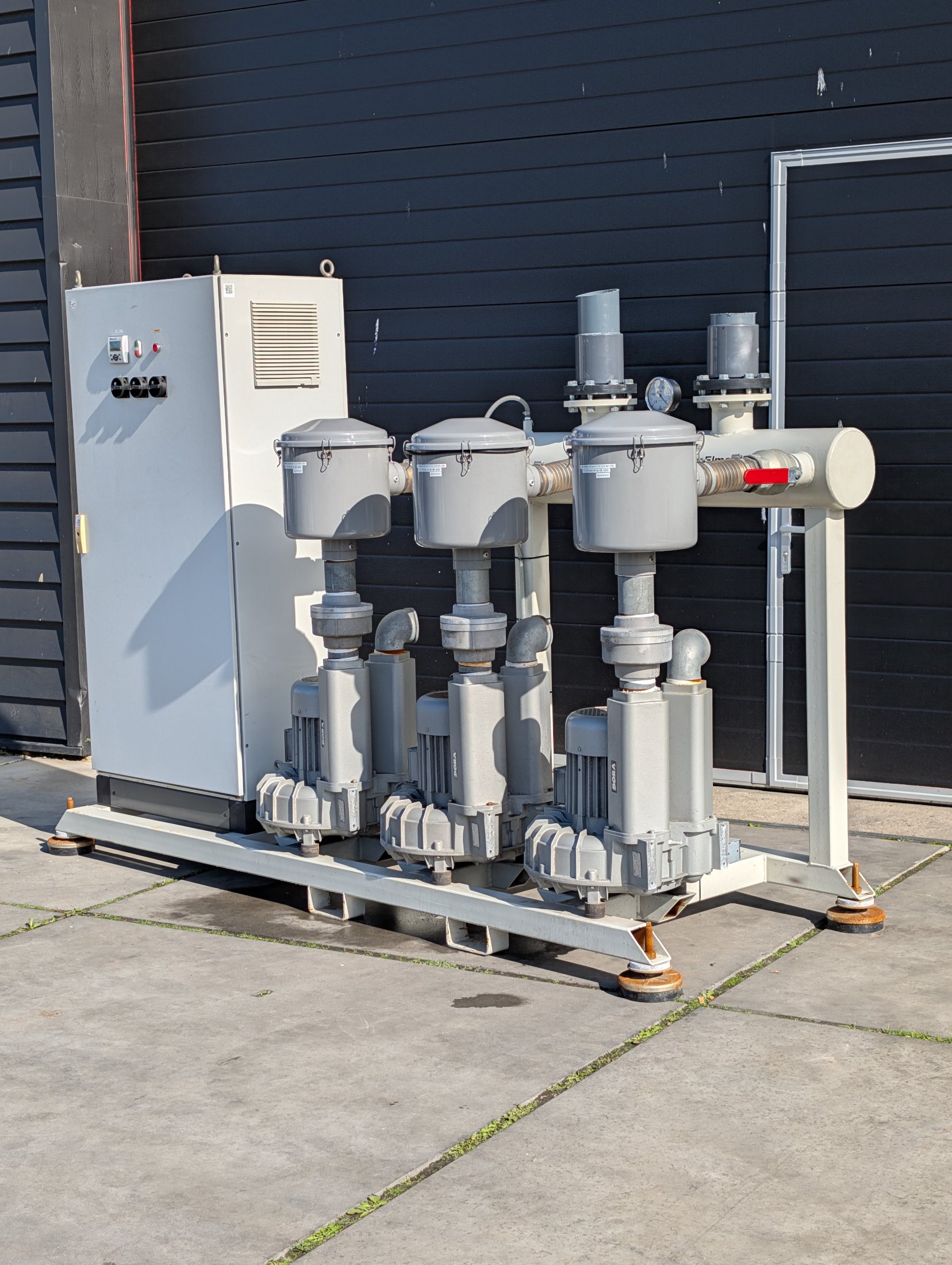 Used Bora SAP 450 three-pump vacuum unit with control cabinet