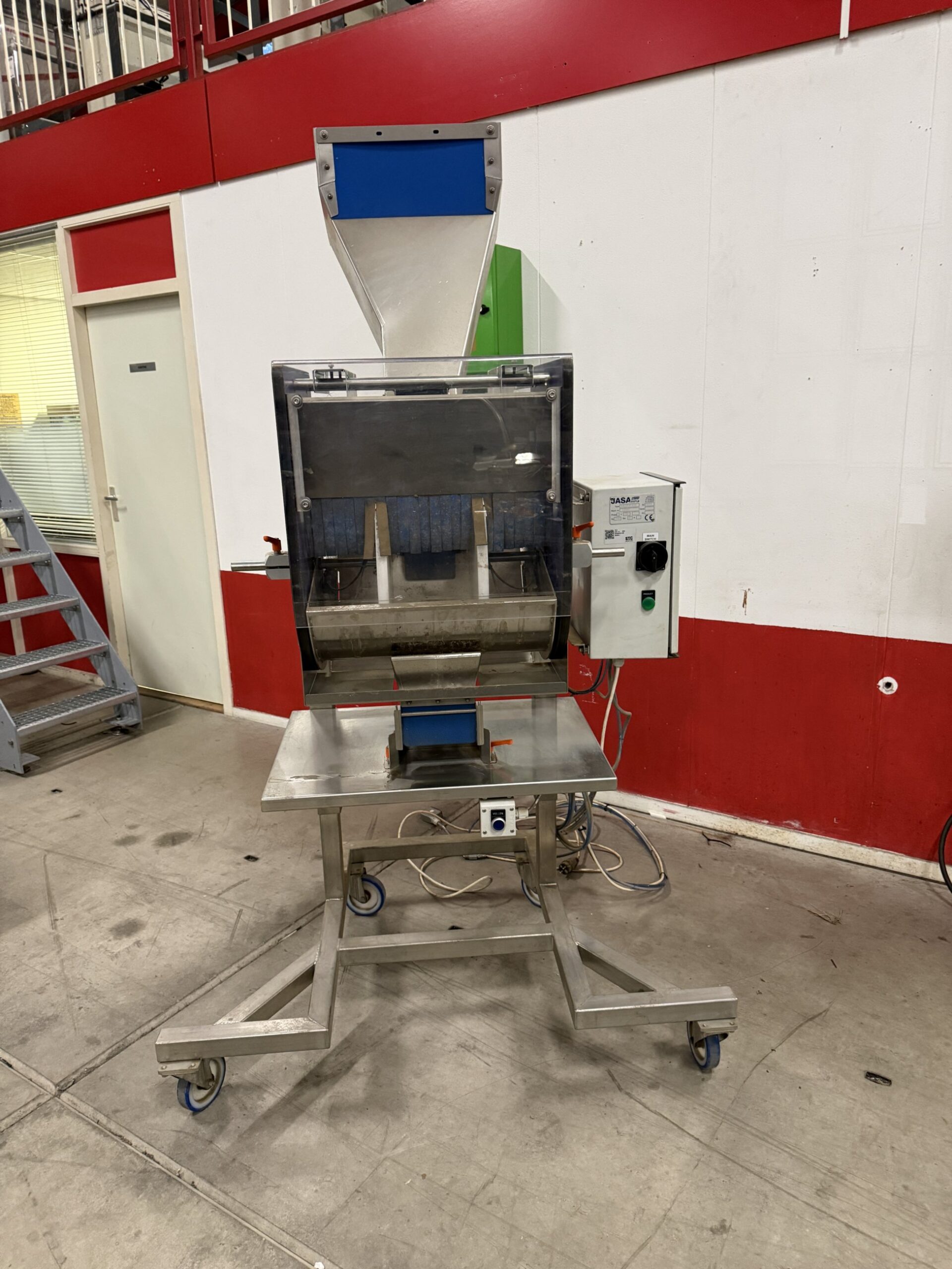 Used 2015 JASA tray filling station for use under a weigher