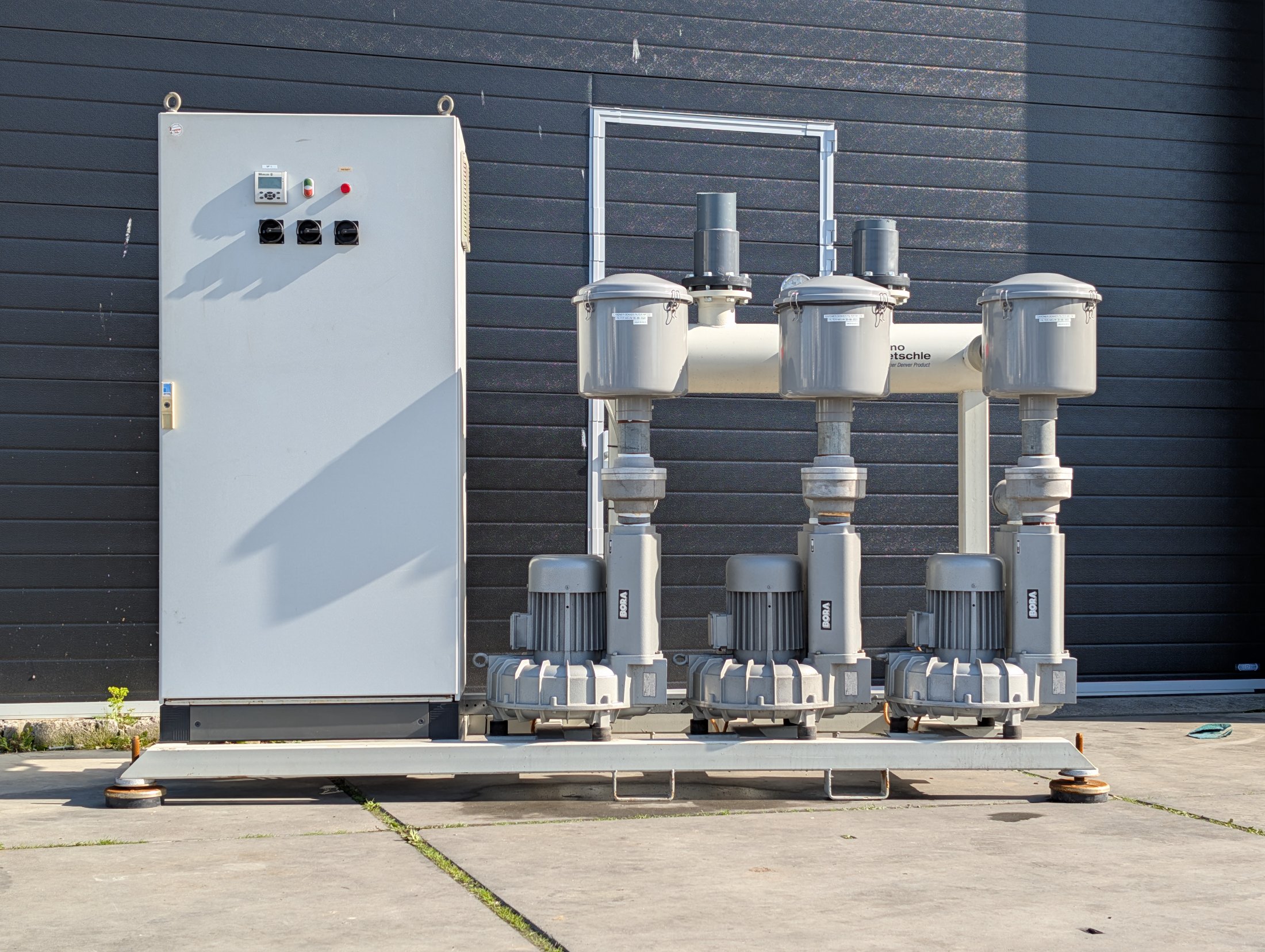 Used Bora SAP 450 three-pump vacuum unit with control cabinet