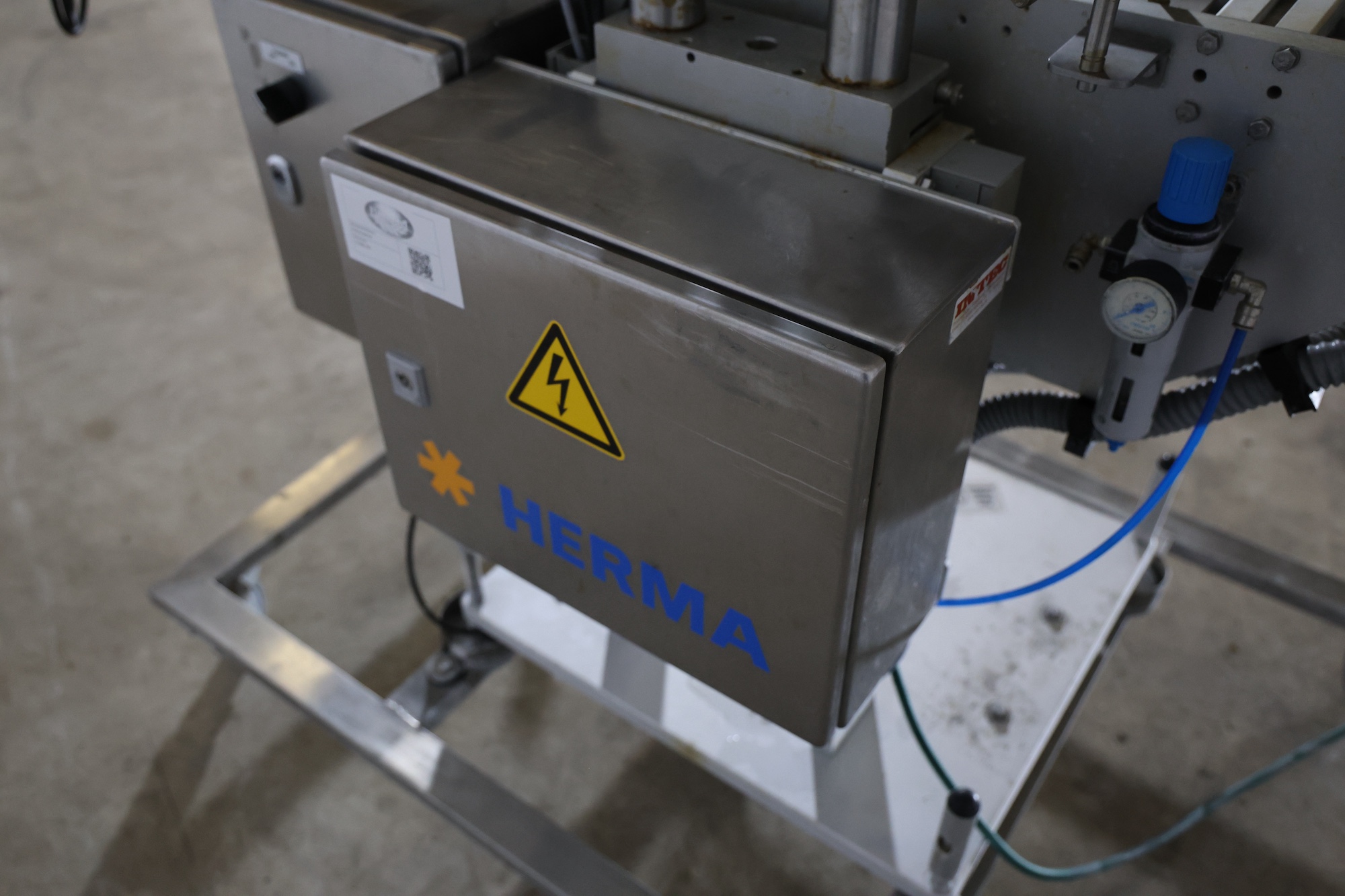 Used 2014 Herma H400 16R Labeling machine on belt