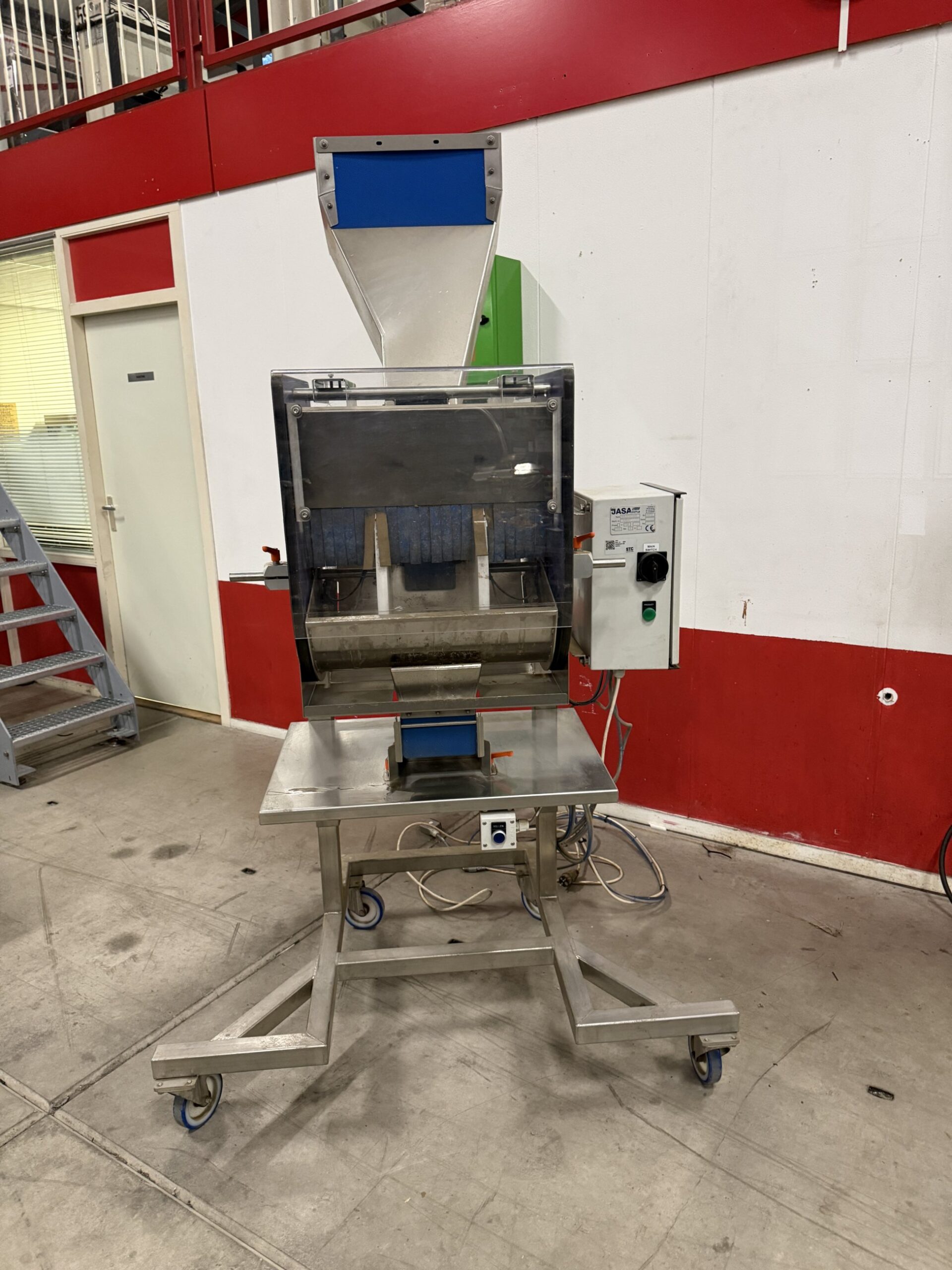 Used 2015 JASA tray filling station for use under a weigher