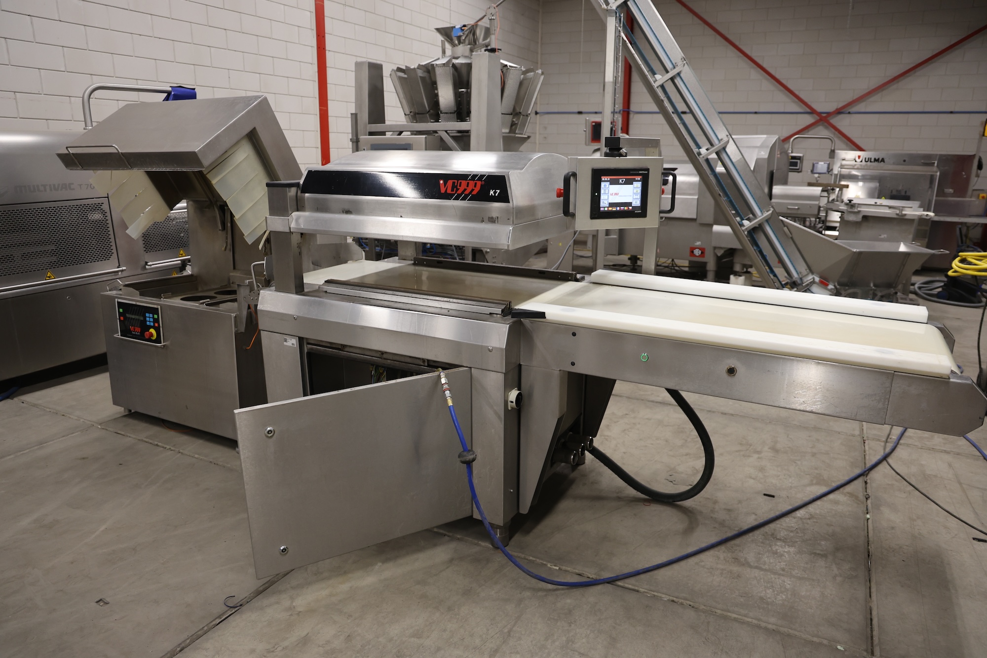 Used 2008 VC999 K7 vacuum line with shrink tunnel