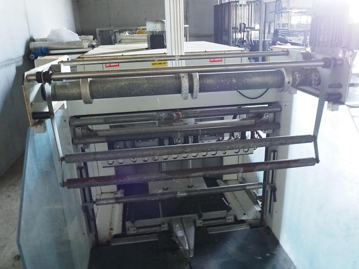 Used 2005 Adpak shrink wrapping machine, mimi uniblock 712