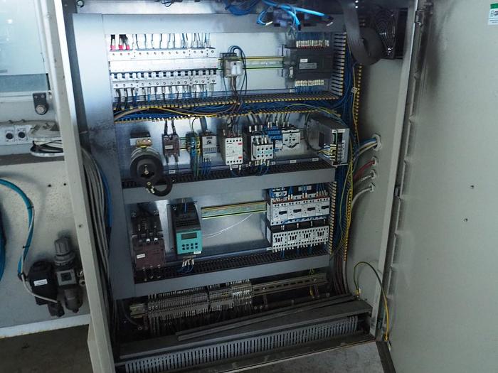 Used 2005 Adpak shrink wrapping machine, mimi uniblock 712