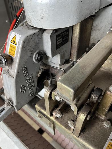 Used Pace mechcanical handling V track stitching line