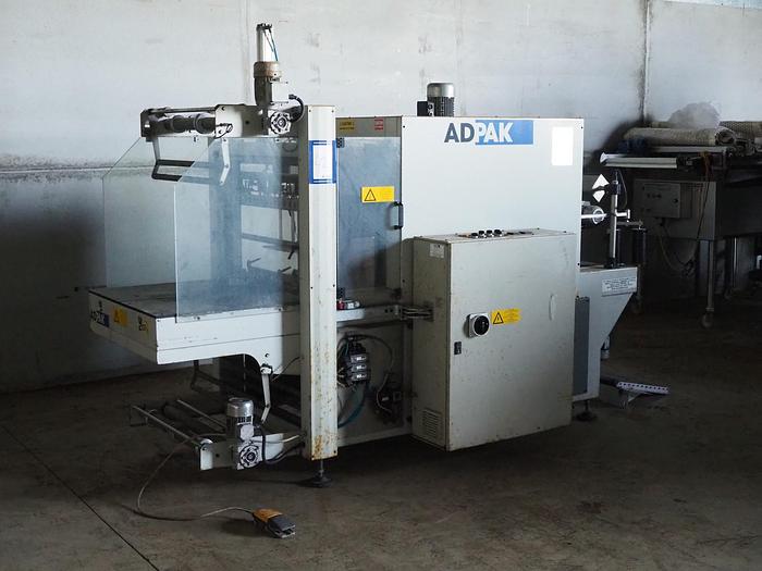 Used 2005 Adpak shrink wrapping machine, mimi uniblock 712
