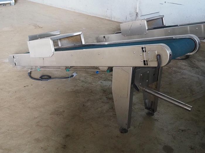 Used Packs conveyor Elevating packs conveyor (6 available)