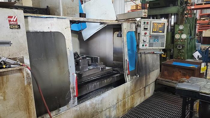 Used 1997 HAAS VF 7/50, Table 28" x 84", X-84", Y-32", Z-30", 30hp, 7500 rpm, 12" 4th Axis Rotary Table, 30+1 ATC, HAAS CNC