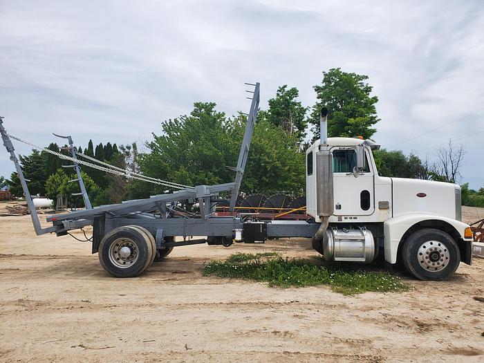 Used 1990 Peterbilt w/ New Holland 1051 Stack Retriever