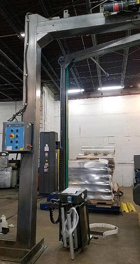 Used Cousins Rotary Arm Semi-Automatic Pallet Wrapper