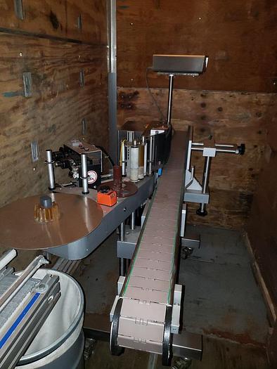 Used EQUIPMENT EXPRESS BOTTLING LINE (FILLER AND CAPPER)