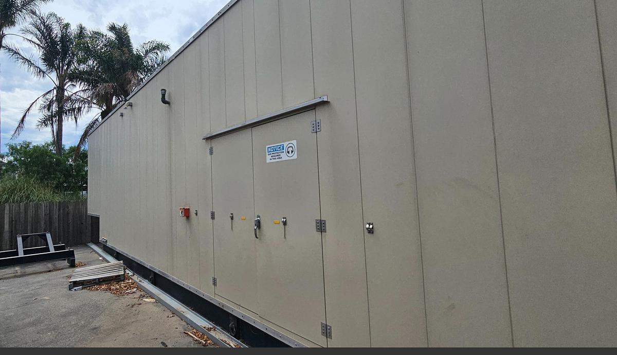 Used Cummins C2000N6CB 480V Gas Generator Set 65dBA at 23ft Enclosure