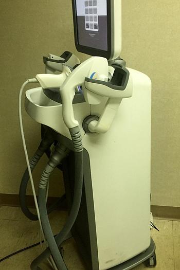 Used Syneron Elos Plus w/ 7 hand pieces