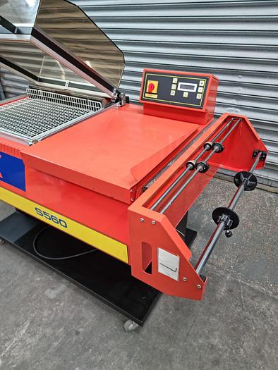 Used Adpak s560 chamber sharing wrap machine