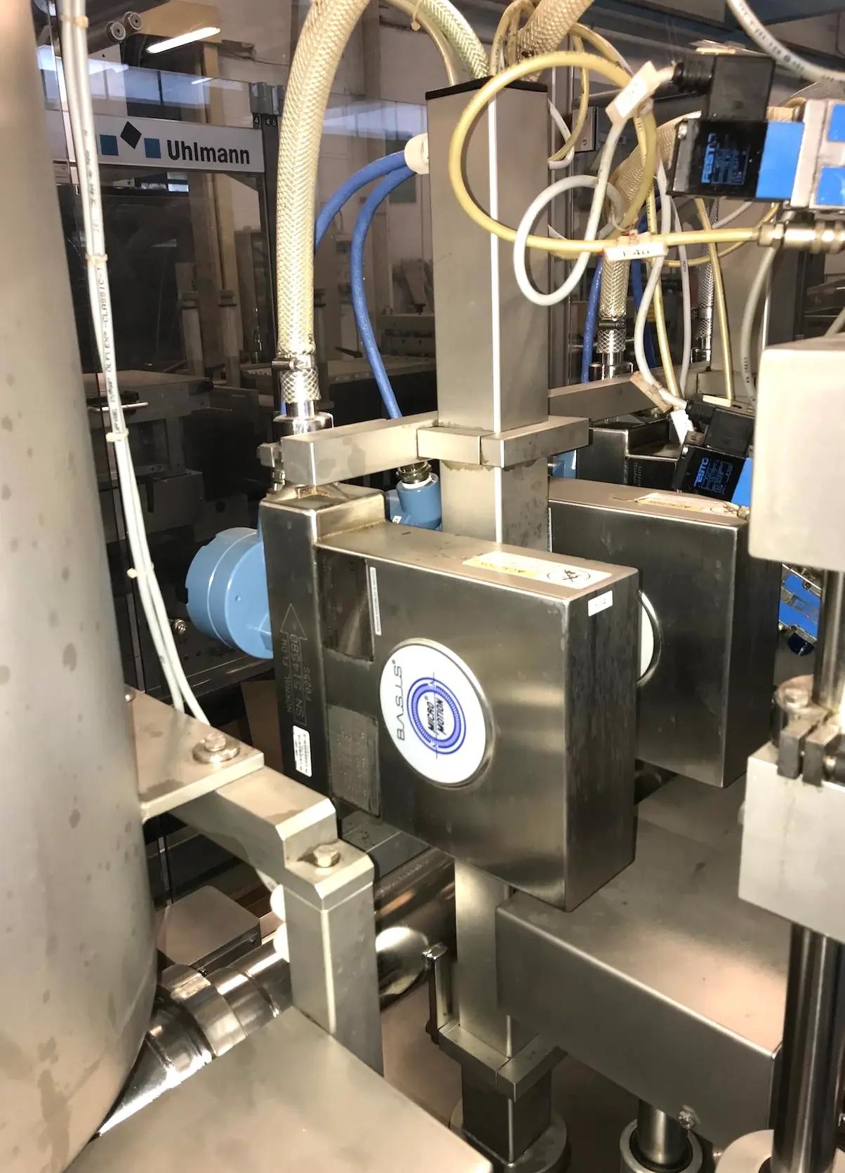 Usato RUDOLF DECKERT - Riempitrice Liquidi - MFM 104