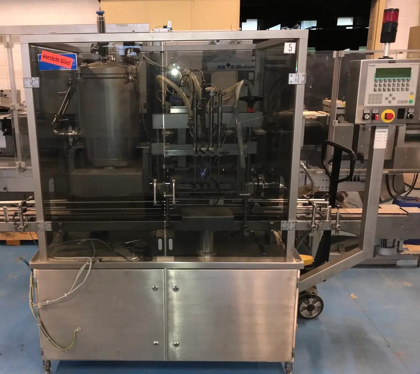 Usato RUDOLF DECKERT - Riempitrice Liquidi - MFM 104