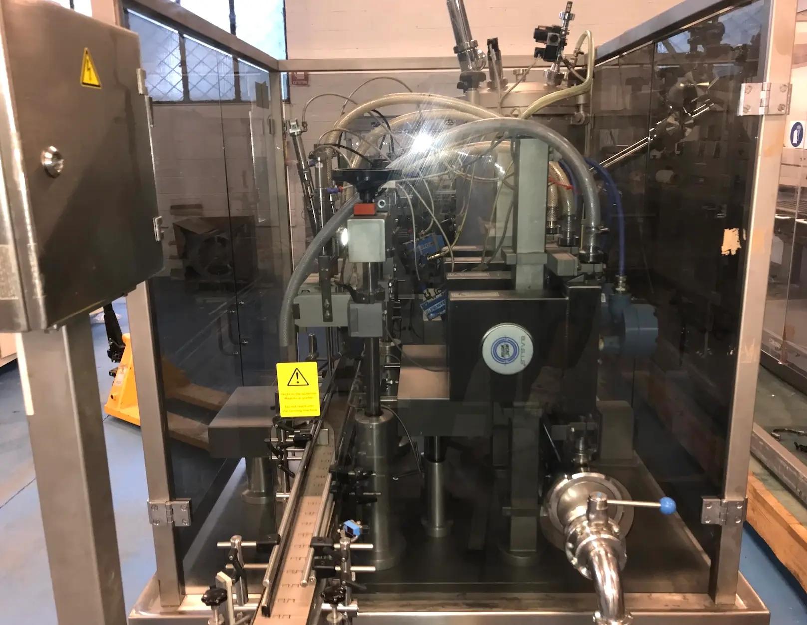 Usato RUDOLF DECKERT - Riempitrice Liquidi - MFM 104