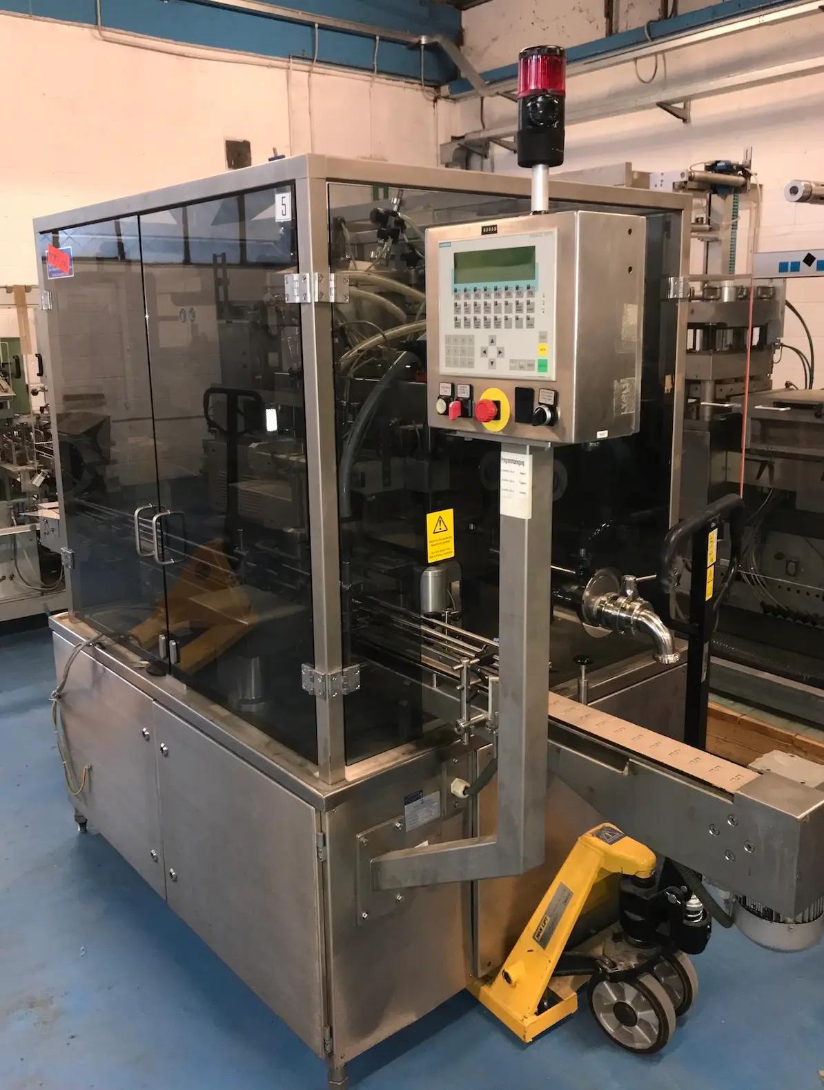 Usato RUDOLF DECKERT - Riempitrice Liquidi - MFM 104