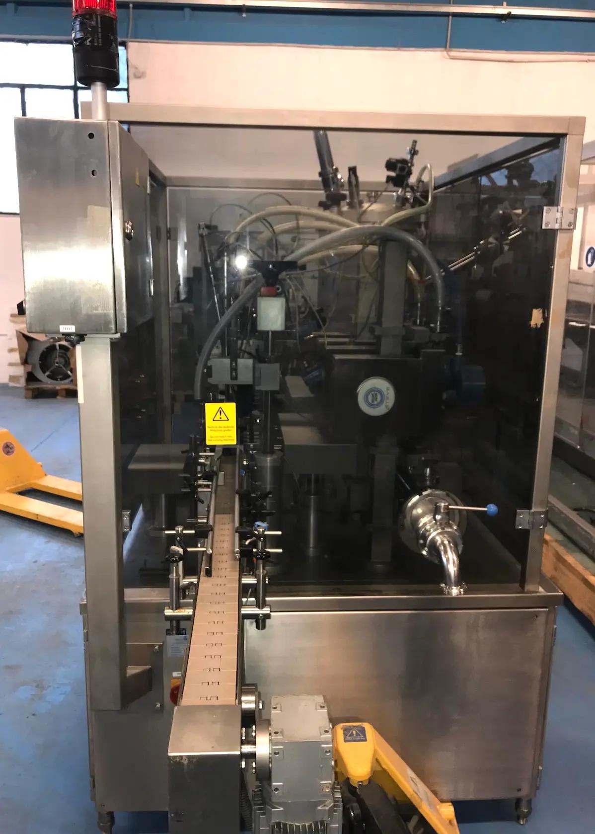 Usato RUDOLF DECKERT - Riempitrice Liquidi - MFM 104