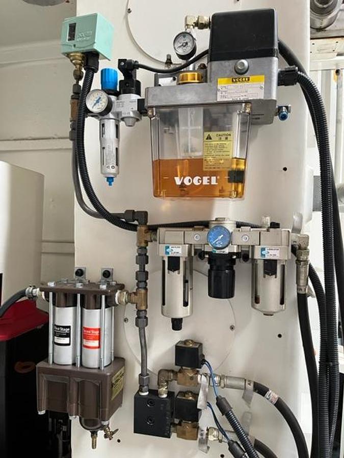 Used Hankook VTC 125 E-APC CNC Single Column Vertical Boring Mill with C-Axis and Double Automatic Pallet Changer