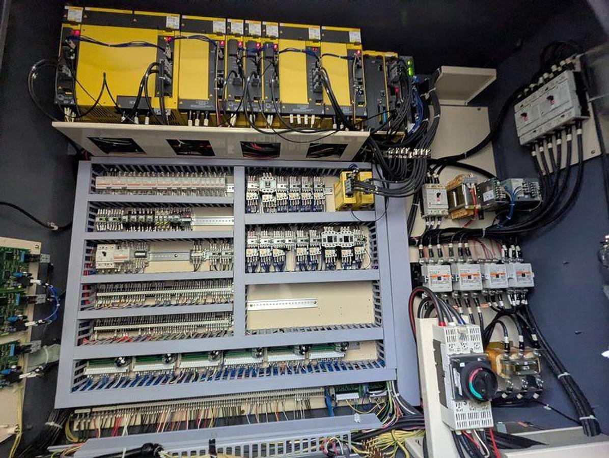 Used Okuma VTM 200YB CNC Vertical Multi-Tasking Machining Center