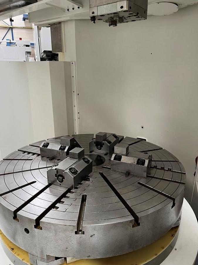 Used Hankook VTC 125 E-APC CNC Single Column Vertical Boring Mill with C-Axis and Double Automatic Pallet Changer