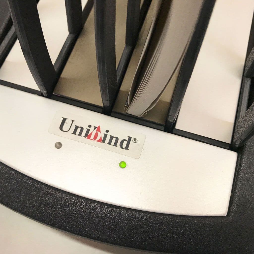 Used Pre-used Unibind S225 Thermal Binding Machine Including More Than 2,200 Graphite-Steel Covers