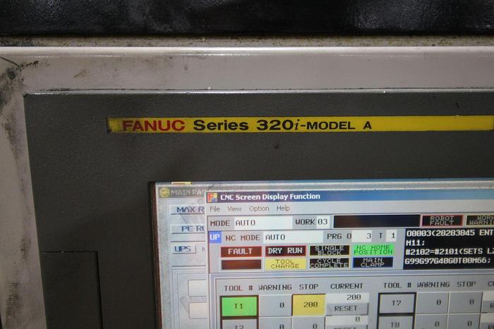 Used FUJI ANS-320TTS TWIN TURRET CNC LATHE WITH ROBOT LOAD/UNLOAD AND STOCKER TABLES