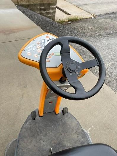 Used TASKI SWINGO 3500 RIDER FLOOR SCRUBBER (DISK) (BATTERY)