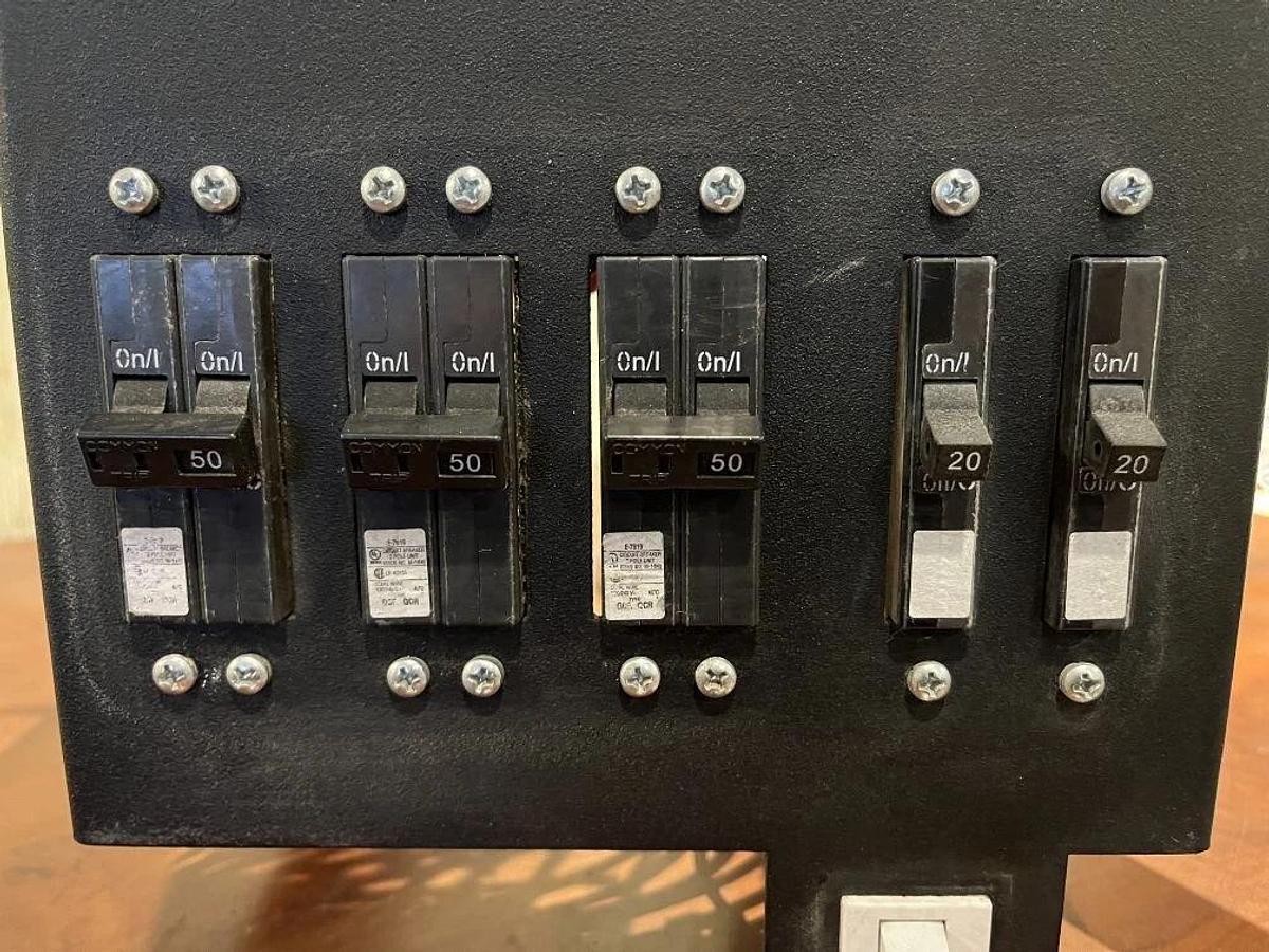 Used Circuit Breaker Bracket from Generac MMG45IF4 with Breakers and Rocker Switch