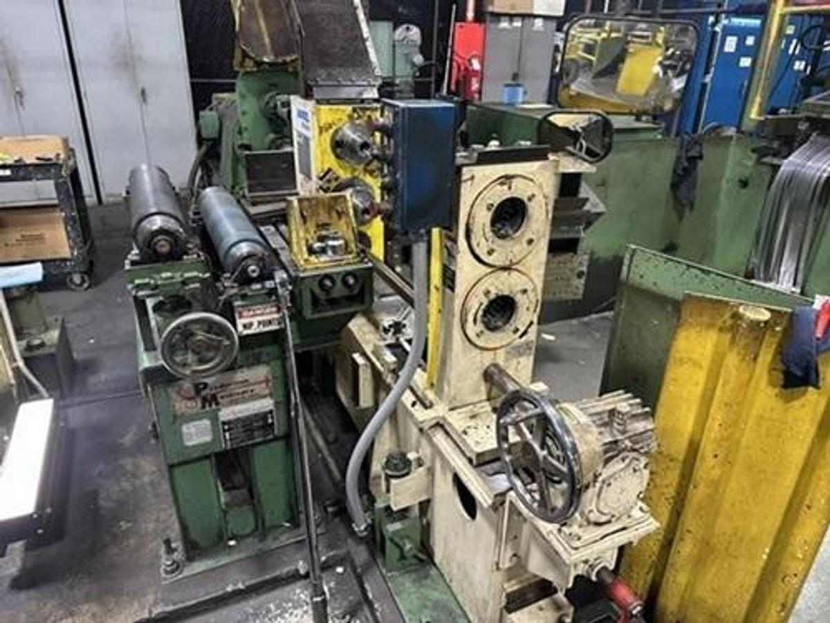 Used 18" x .025" PM / Andritz Oscillating Slitting Line with 12 Recoilers