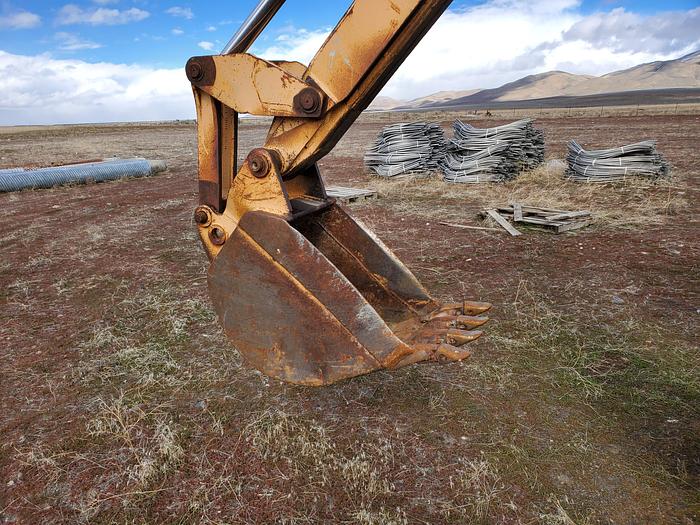 Used Case 580SE Backhoe w/ Attachments