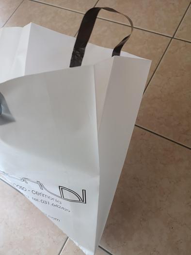 Used 2001 De Benardi 100 E SH 9 for the production of film soft loop handles bags