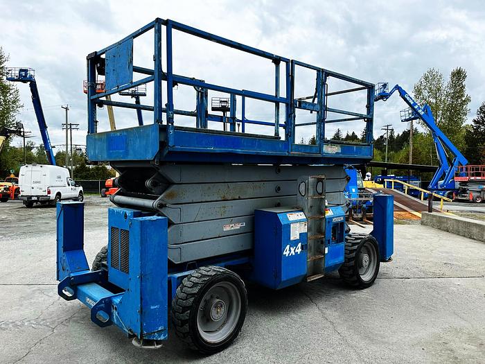 Used 2005 Genie GS-5390 RT Rough Terrain Scissor Lift, 4 x 4, Dual Fuel, Outriggers
