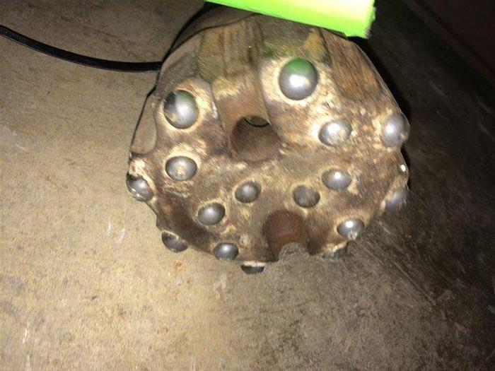 Used HAMMER BIT, SD4 SHANK, 5 1/8" HEAD, CONCAVE FACE, DOMED BUTTONS