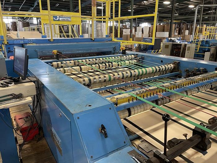 Used 65" JAGENBERG SYNCRO DUAL ROTARY KNIFE SHEETER W/ 4 SHAFTLESS UNWIND STANDS