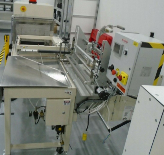 Used Belco STC2520C shrink packaging system with L-Sealer and Fan Shrink Tunnel