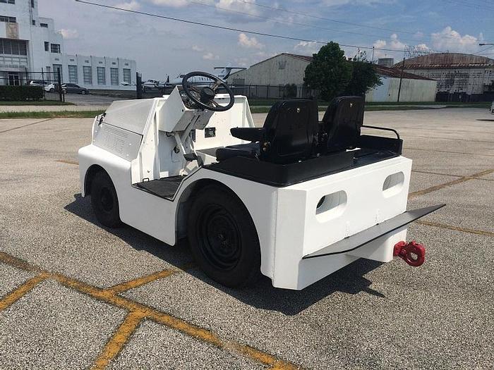 Used 1999 TUG MI60-13 baggage tow tractor. Power Steering. Zero-timed engine.